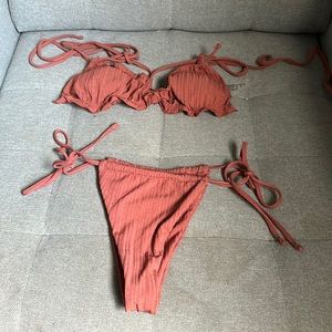 This is a new unused bikini Medium sized! Ordered online never been used!